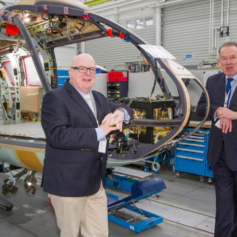 Bruce Burns, Vice-Chairman and Peter Sunderland, Chairman with the YAA’s first new H145 on the production line in Munich
