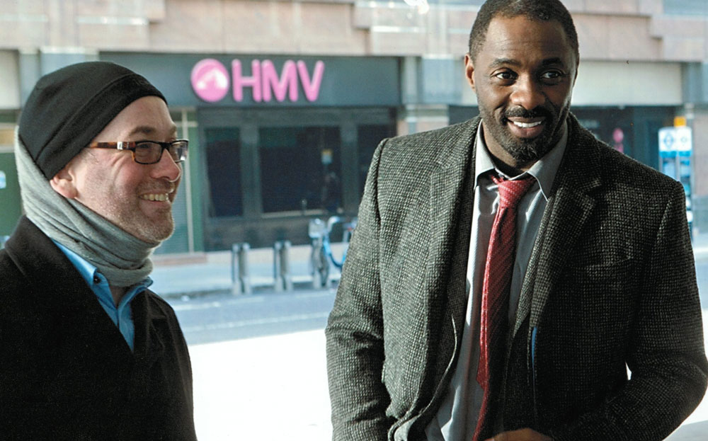 Neil Cross and Idris Elba