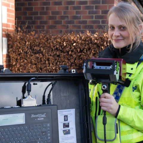 PCSO Natalie Kitching with the "dot peen" property marking machine