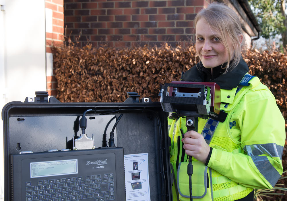 PCSO Natalie Kitching with the "dot peen" property marking machine