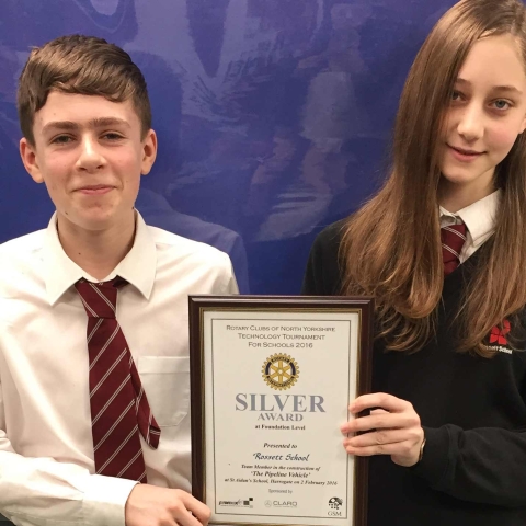 Rossett School students Adam Sherratt and Ellie Whitehead with their silver award at the Rotary Technology Competition