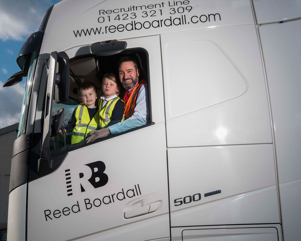 Boroughbridge Primary School pupils Lewis Pitts and Laila Brear with Paul Satariano of Reed Boardall