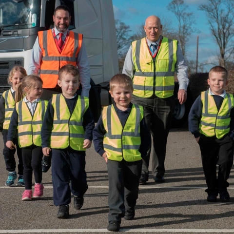 Boroughbridge Primary School pupils Abi Ross, Laila Brear, Lewis Pitts, Rupert Westbury, Lindon Croyle and Hugo Brown with Paul Satariano and Frank Appleton of Reed Boardall