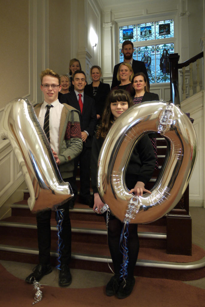 Ten out of ten...Stephen Kirk and Freya Prince thank the team at Si Recruitment as it celebrates 10 years of charity support to Harrogate and Ripon's young carers