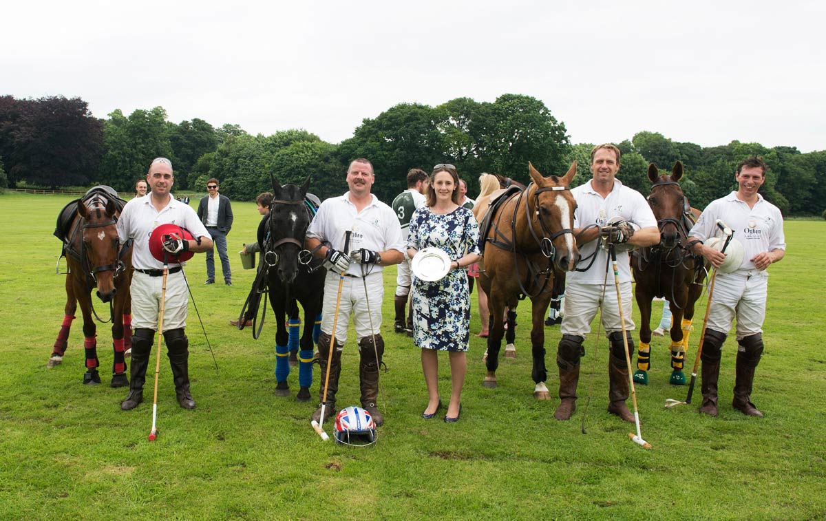 Susanna Ogden presenting the Leolene Lions with the Ogden of Harrogate Armada Dish