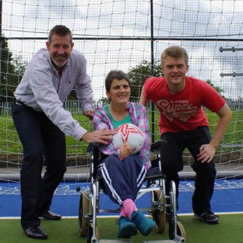 Goal! Former England, Leeds United and Everton goalkeeper Nigel Martyn (left) kicks off Disability Action Yorkshire’s Own Goals initiative with the help of Eliza Bennett and James Parker