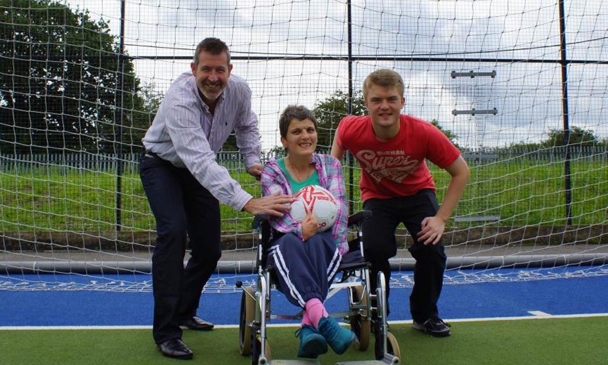 Goal! Former England, Leeds United and Everton goalkeeper Nigel Martyn (left) kicks off Disability Action Yorkshire’s Own Goals initiative with the help of Eliza Bennett and James Parker