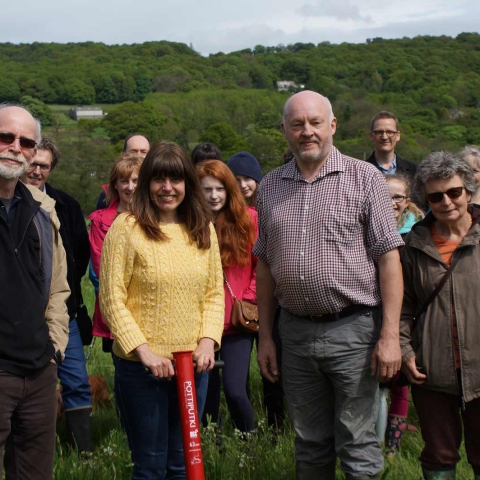 Michael Emsley (centre) with some of the volunteer workforce who have helped to create a new woodland on the edge of the Nidderdale community of Dacre Banks