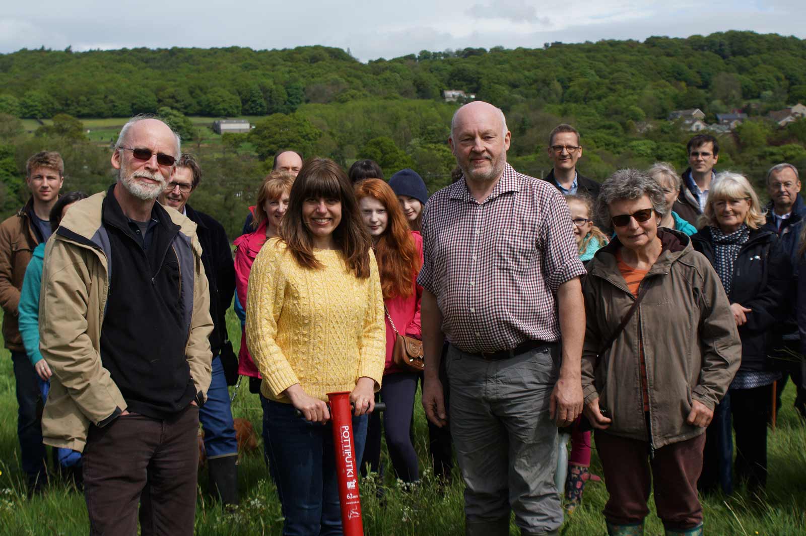 Michael Emsley (centre) with some of the volunteer workforce who have helped to create a new woodland on the edge of the Nidderdale community of Dacre Banks