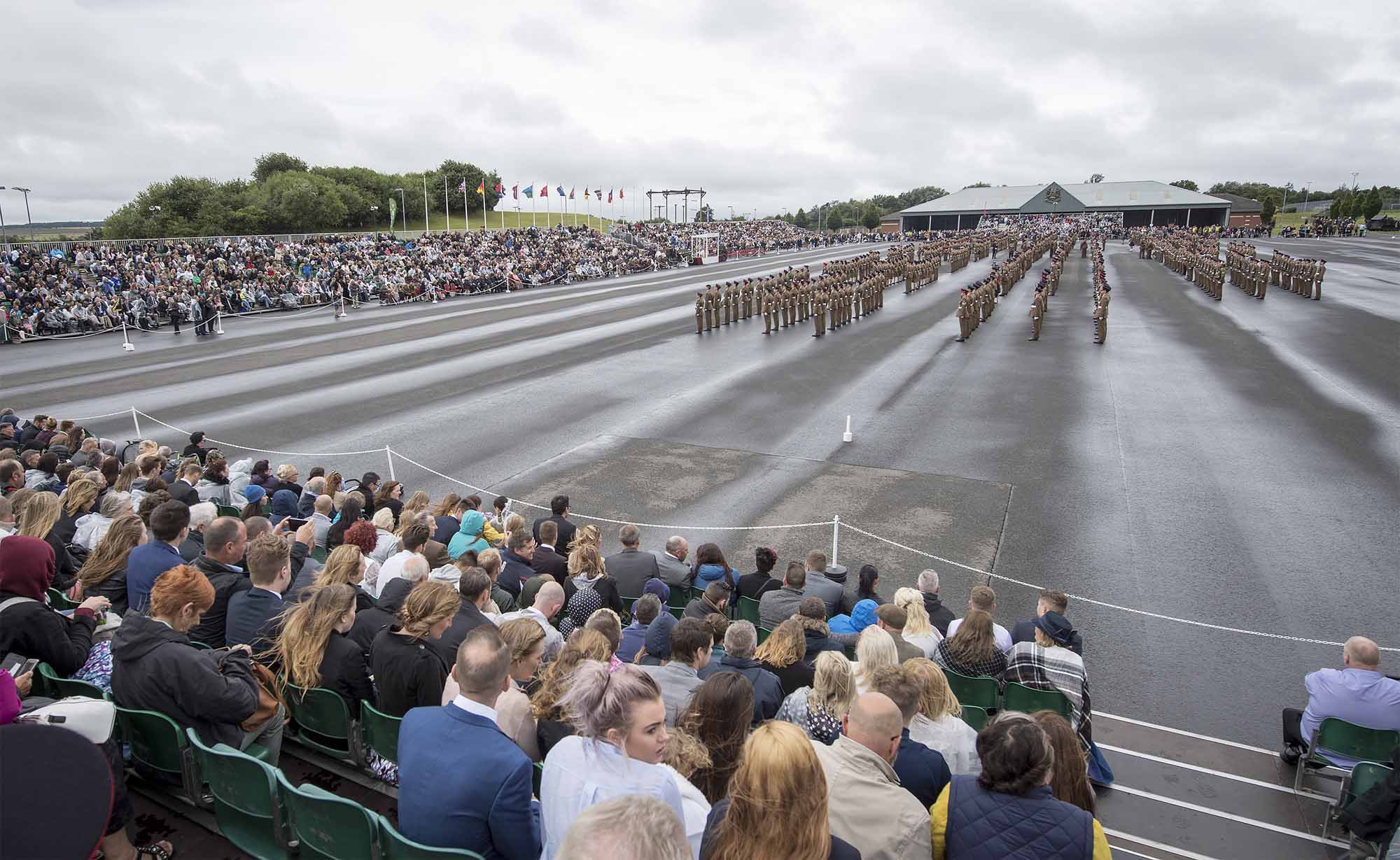 Pictured:Friends and family proudly watching their loved ones during the parade. More than 600 teenagers from the Army Foundation College marched on their way to a new career when they graduated from the military training establishment in Harrogate, North Yorkshire. The college in Penny Pot Lane, Harrogate runs two types of course – a 40-week long course and a shorter 20-week course to train 16-17 year olds for a wide variety of Army careers. NOTE TO DESKS:  MoD release authorised handout images.  All images remain Crown Copyright 2016.  Photo credit to read -Sgt Jamie Peters RLC (Phot) Email: jamiepeters@mediaops.army.mod.uk richardwatt@mediaops.army.mod.uk shanewilkinson@mediaops.army.mod.uk Richard Watt - 07836 515306 Shane Wilkinson - 07901 590723