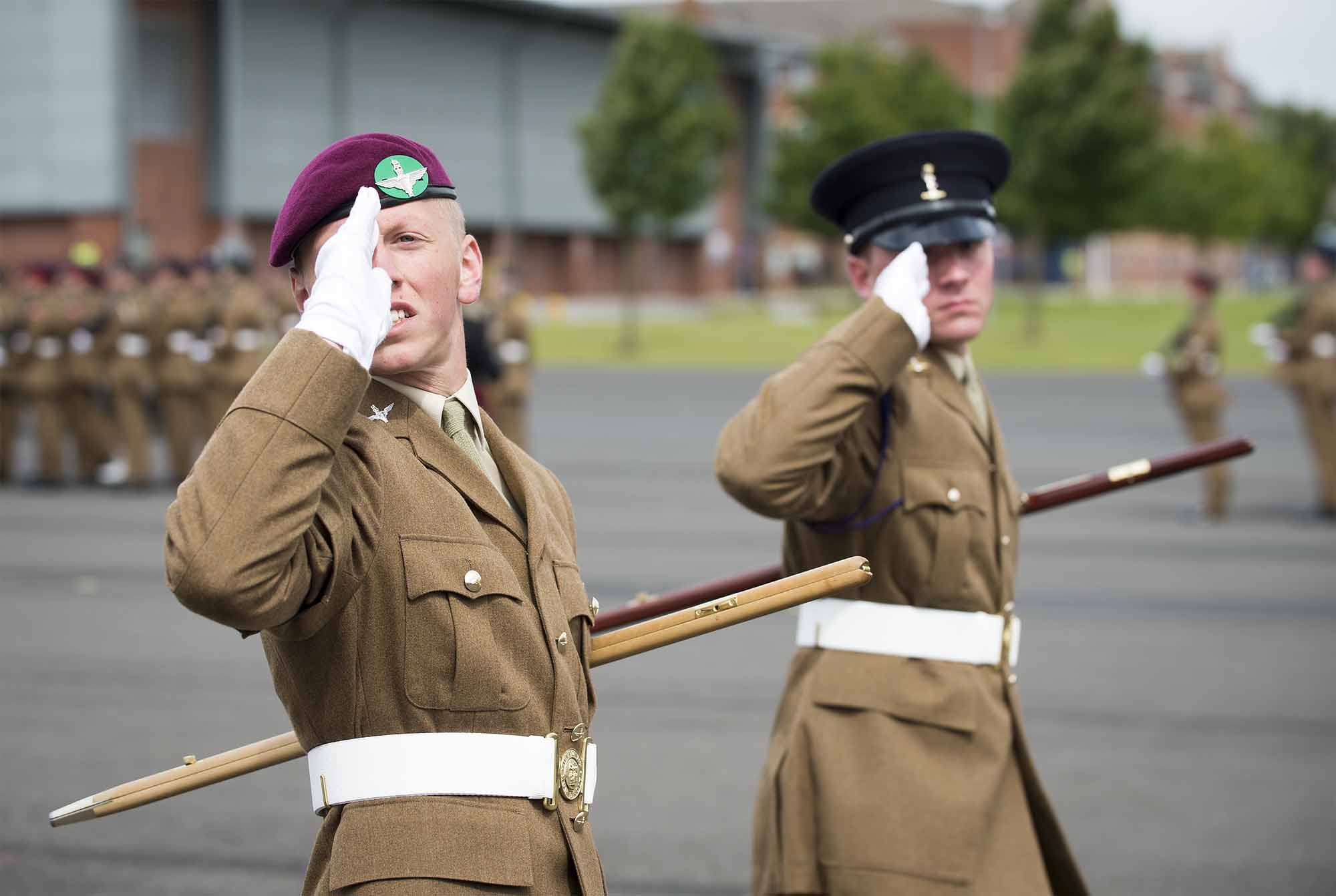 Pictured:Junior Soldiers Wilson (left) and Frame saluting the inspecting officer. More than 600 teenagers from the Army Foundation College marched on their way to a new career when they graduated from the military training establishment in Harrogate, North Yorkshire. The college in Penny Pot Lane, Harrogate runs two types of course – a 40-week long course and a shorter 20-week course to train 16-17 year olds for a wide variety of Army careers. NOTE TO DESKS:  MoD release authorised handout images.  All images remain Crown Copyright 2016.  Photo credit to read -Sgt Jamie Peters RLC (Phot) Email: jamiepeters@mediaops.army.mod.uk richardwatt@mediaops.army.mod.uk shanewilkinson@mediaops.army.mod.uk Richard Watt - 07836 515306 Shane Wilkinson - 07901 590723
