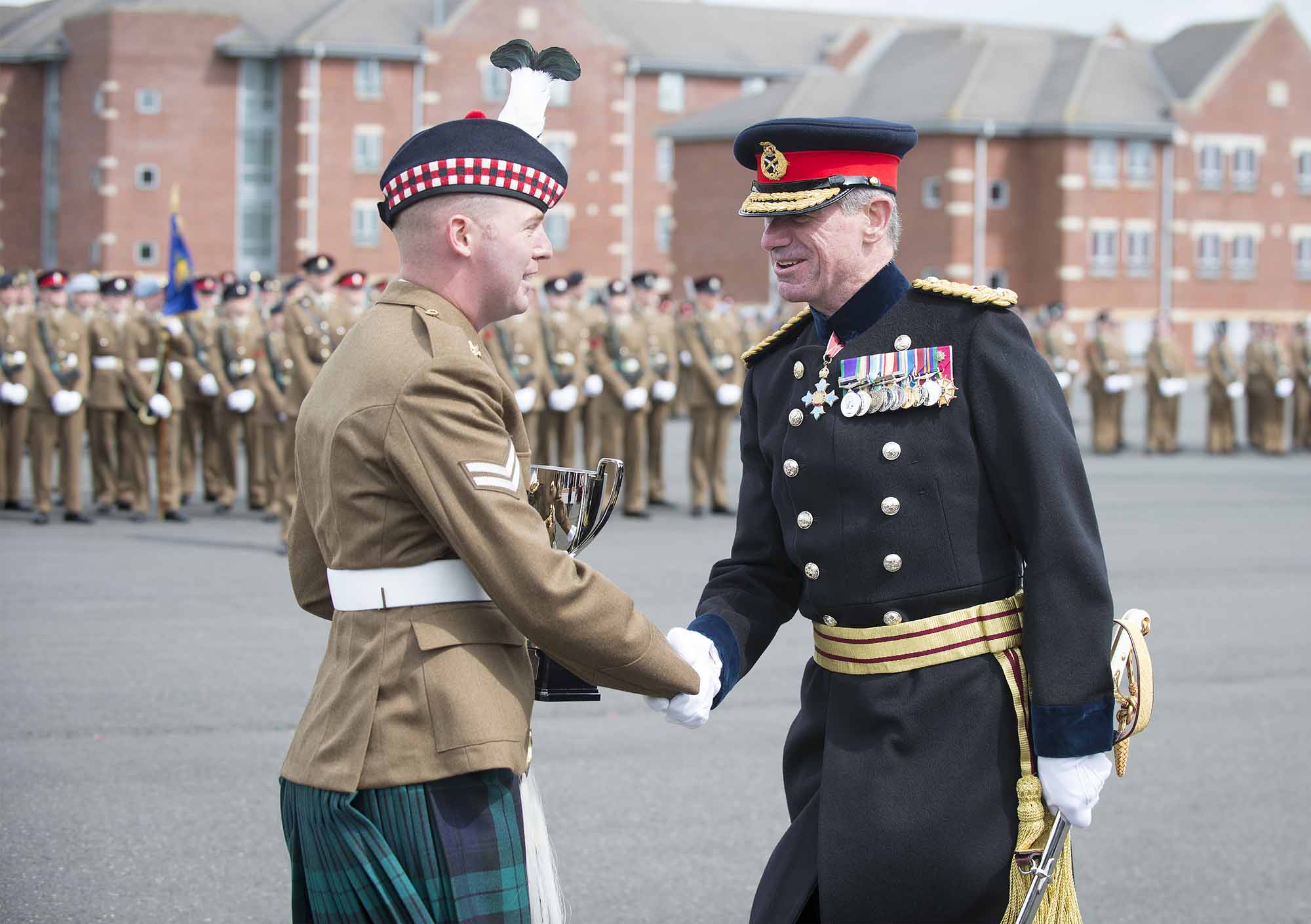Pictured:Corporal McMurtry from The Royal Regiment of Scotland receiving the Inspirational Leader Award from Lieutenant General Beckett CBE, Defence Senior Advisor Middle East.   More than 600 teenagers from the Army Foundation College marched on their way to a new career when they graduated from the military training establishment in Harrogate, North Yorkshire. The college in Penny Pot Lane, Harrogate runs two types of course – a 40-week long course and a shorter 20-week course to train 16-17 year olds for a wide variety of Army careers. NOTE TO DESKS:  MoD release authorised handout images.  All images remain Crown Copyright 2016.  Photo credit to read -Sgt Jamie Peters RLC (Phot) Email: jamiepeters@mediaops.army.mod.uk richardwatt@mediaops.army.mod.uk shanewilkinson@mediaops.army.mod.uk Richard Watt - 07836 515306 Shane Wilkinson - 07901 590723