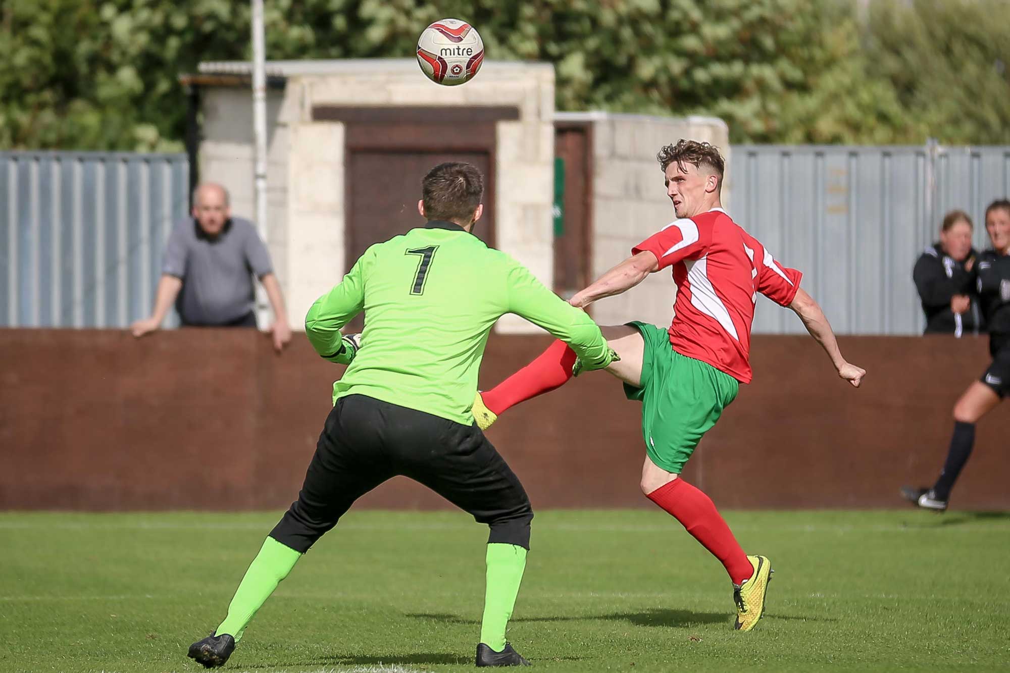 Ryan Sharrocks lobs the Norton ‘keeper to put Railway back into the lead (2-1)