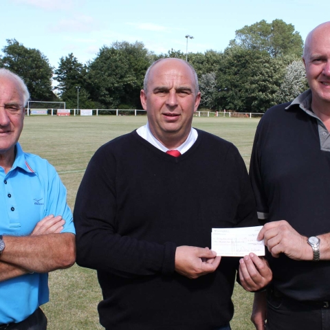 rian Clifford (Left) & Graham Gotts (Right) Being Presented With The Cheque By Knaresborough Town Chairman Peter Plews (Center)