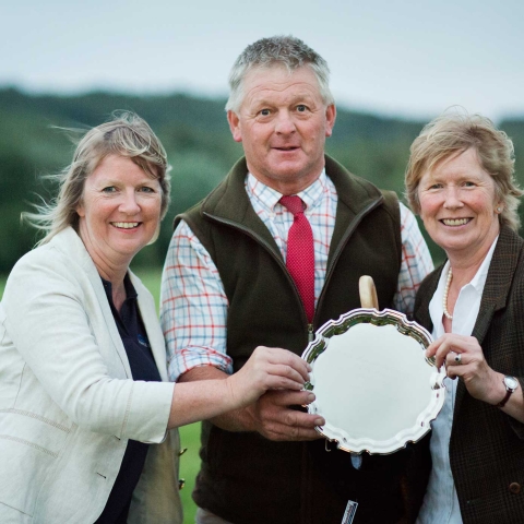 TRAIL PLEASE! Pictured (L to R) presenting the trophy in memory of sheepdog trialist, Jack Hollows, are: PB Curran operations director, Linda Pepper, winner Jed Watson and Gena Douglas