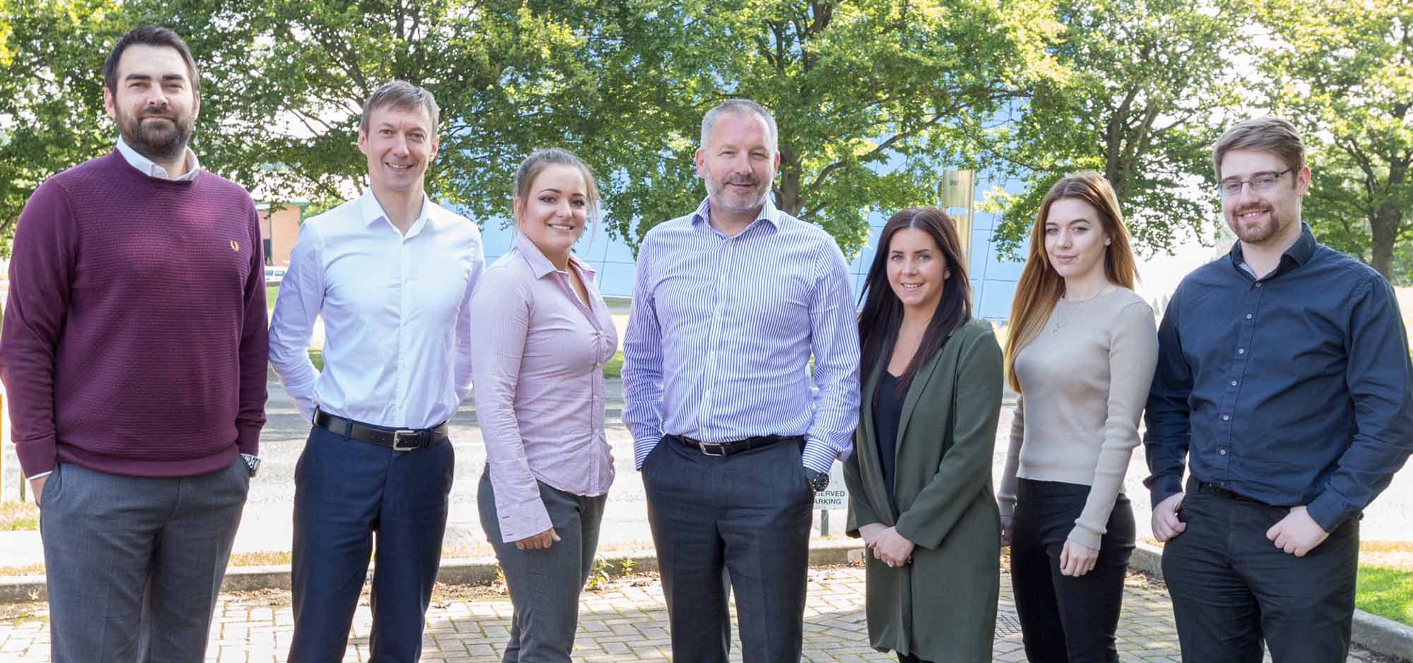 Fuelling growth with top talent: Synergy Automotive MD, Paul Parkinson (centre) with new team members