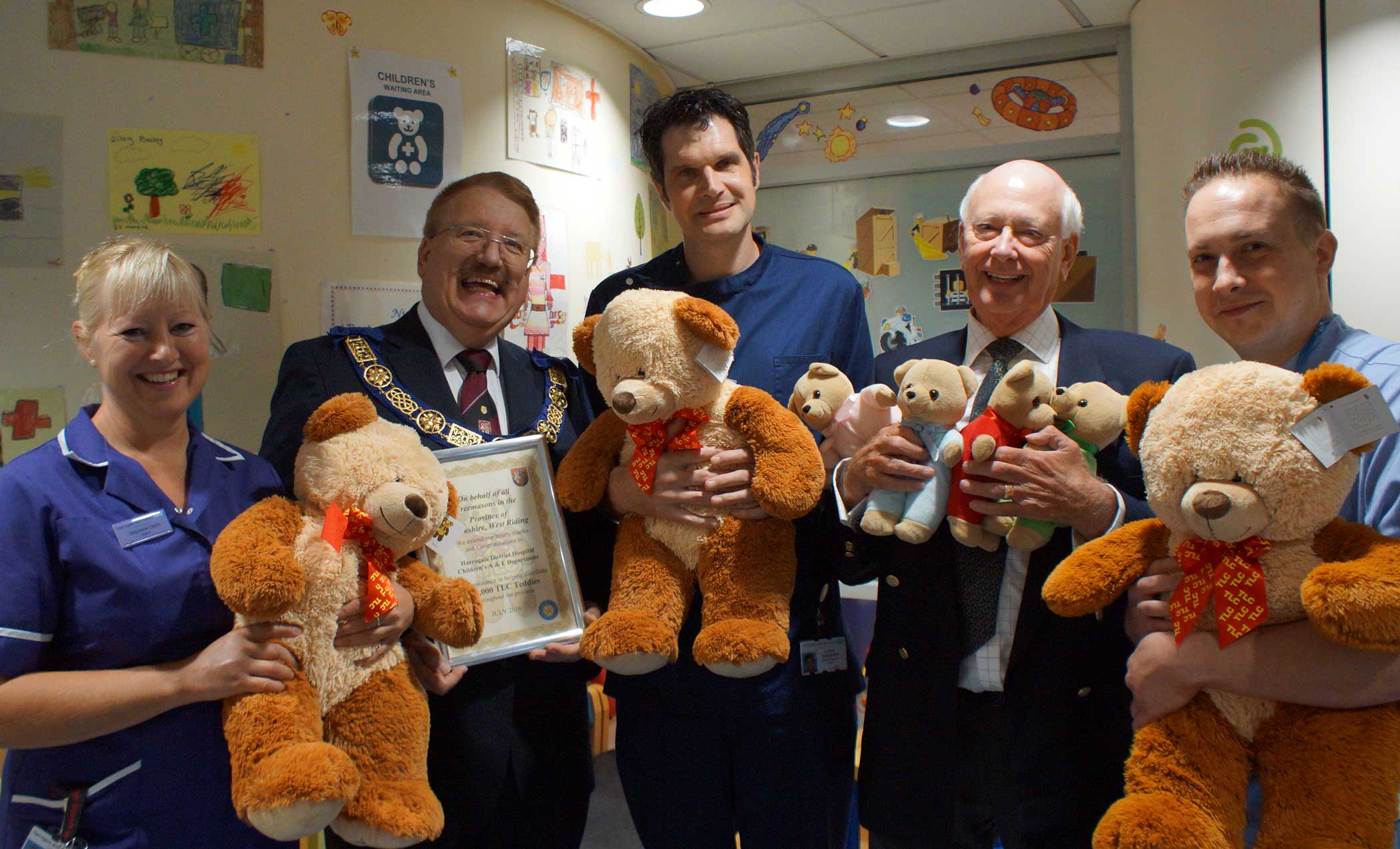 Remarkable Milestone! Pictured from left are Matron Steph Davis, Freeman’s Provincial Grand Master, Rt W. David Pratt; A&E Charge Nurse David Haggart; Chairman of West Riding Masonic Charities Jack Pigott and Staff Nurse Peter Monks