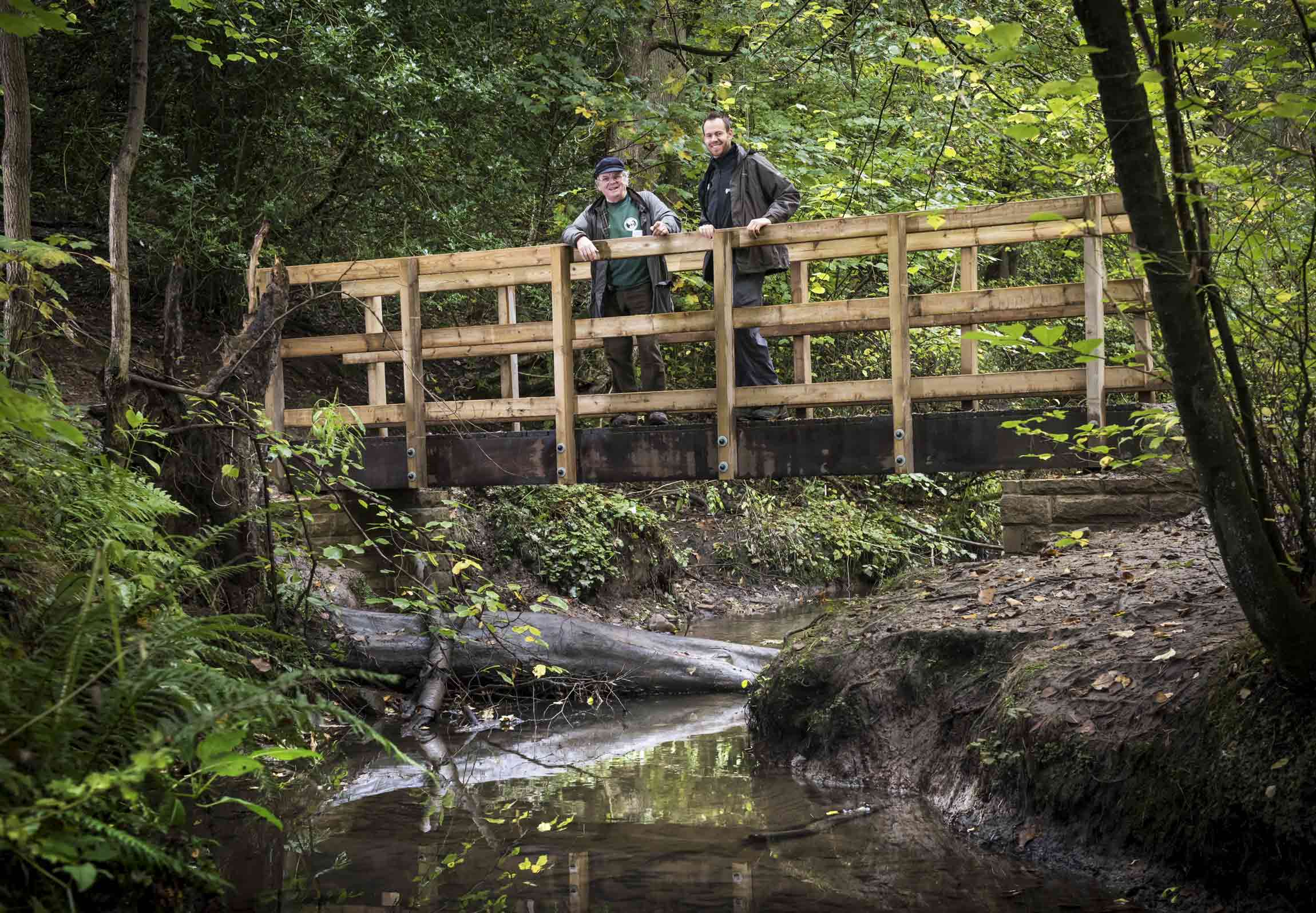 North Yorkshire County Council Public Rights of Way Officer Mike Gurney with Keith Wilkinson of Bilton Conservation Group (wearing the cap) at the new bridge over Bilton Beck