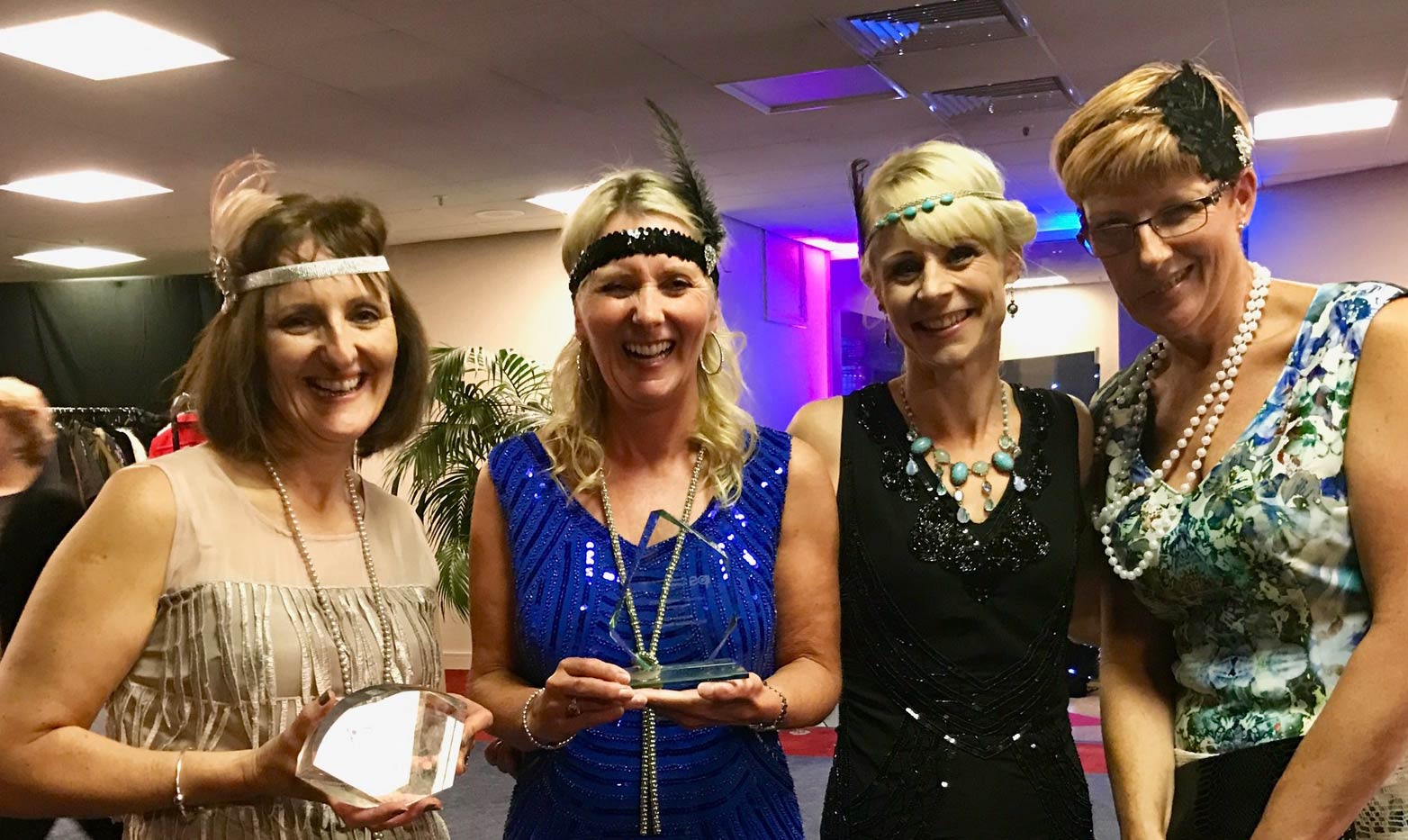 at the 1920s themed Awards Evening (left to right): Gill Johnson, Community Infection Prevention and Control  Nurse; Sonya Ashworth, Team Lead Community Infection Prevention and Control; Helen Degnan, Community Infection Prevention and Control Support Nurse; and Kath Banfield, Matron, Infection Prevention and Control.
