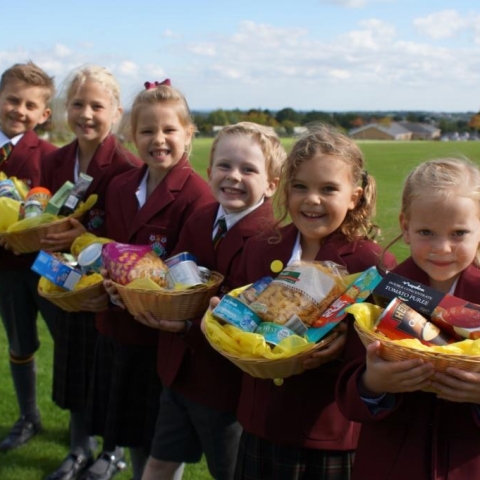 Bountiful Harvest!  Pupils from Ashville Pre Prep School and their Harvest Festival gifts
