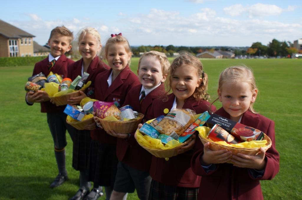 Bountiful Harvest!  Pupils from Ashville Pre Prep School and their Harvest Festival gifts