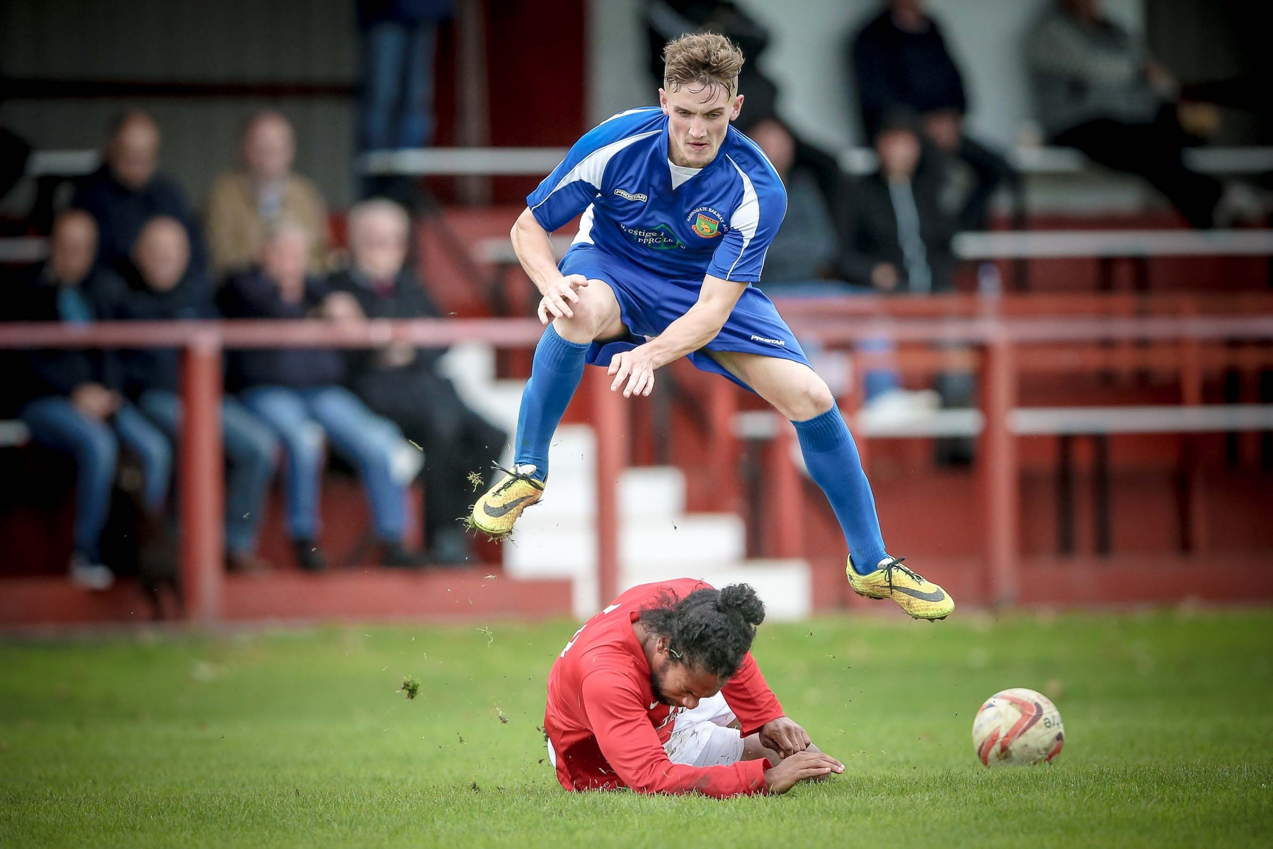 Ryan Sharrocks goes over his opponent rather than around - during Railway's 2-1 loss away to Thackley