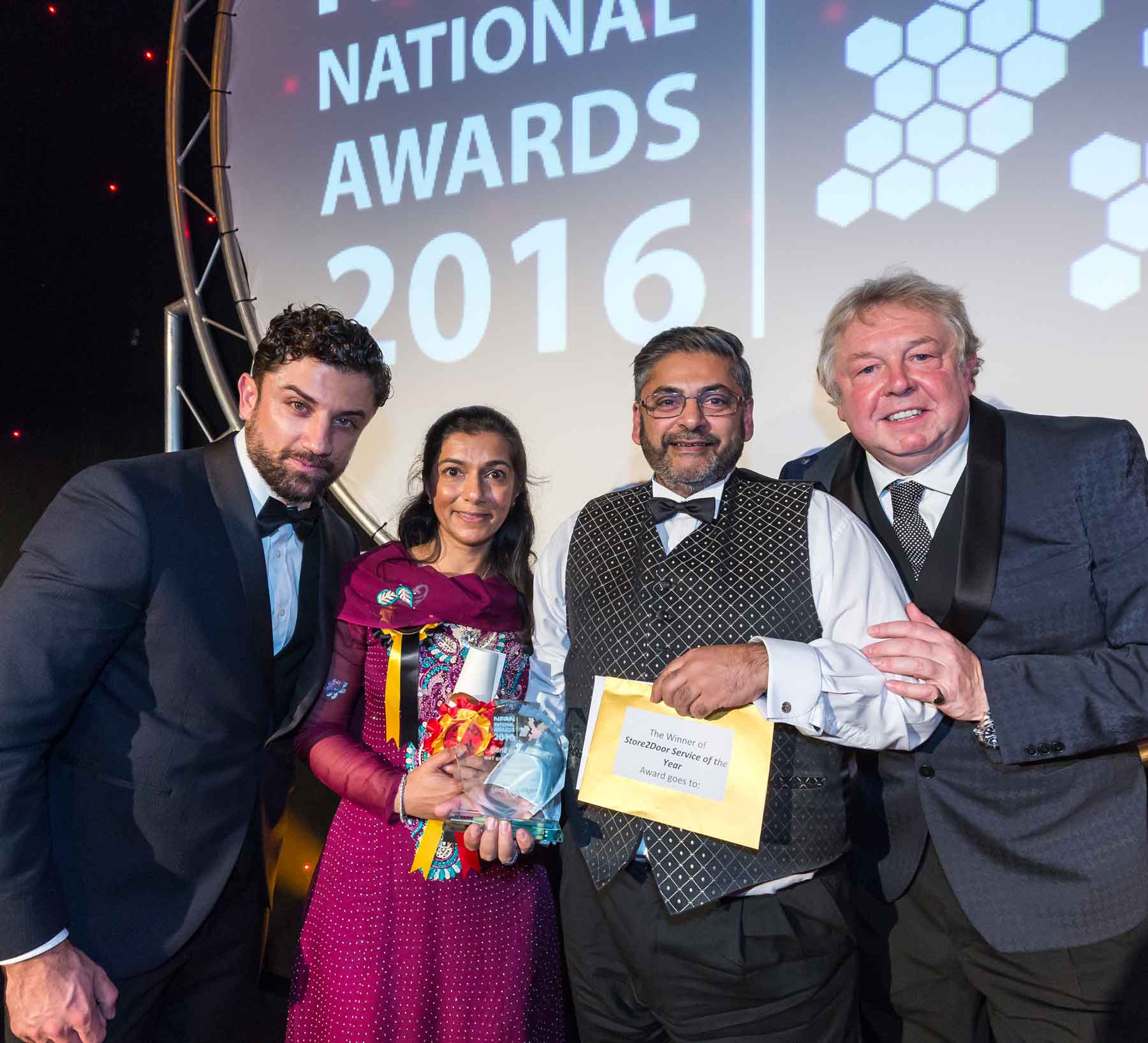 Mr Bhaiji is pictured receiving his trophy from Liam Cagliarini, Head of Proximity Sales at epay, which sponsored the category, and Mr Ferrari