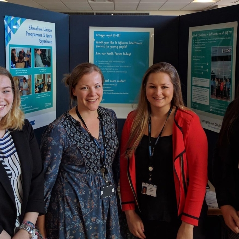 HDFT staff colleagues Emily Reid and Bethany Maguire (centre) with students Amy Wotherspoon and Hannah Zammitt) finding out more about the Youth Forum at the Trust’s Annual Open Event