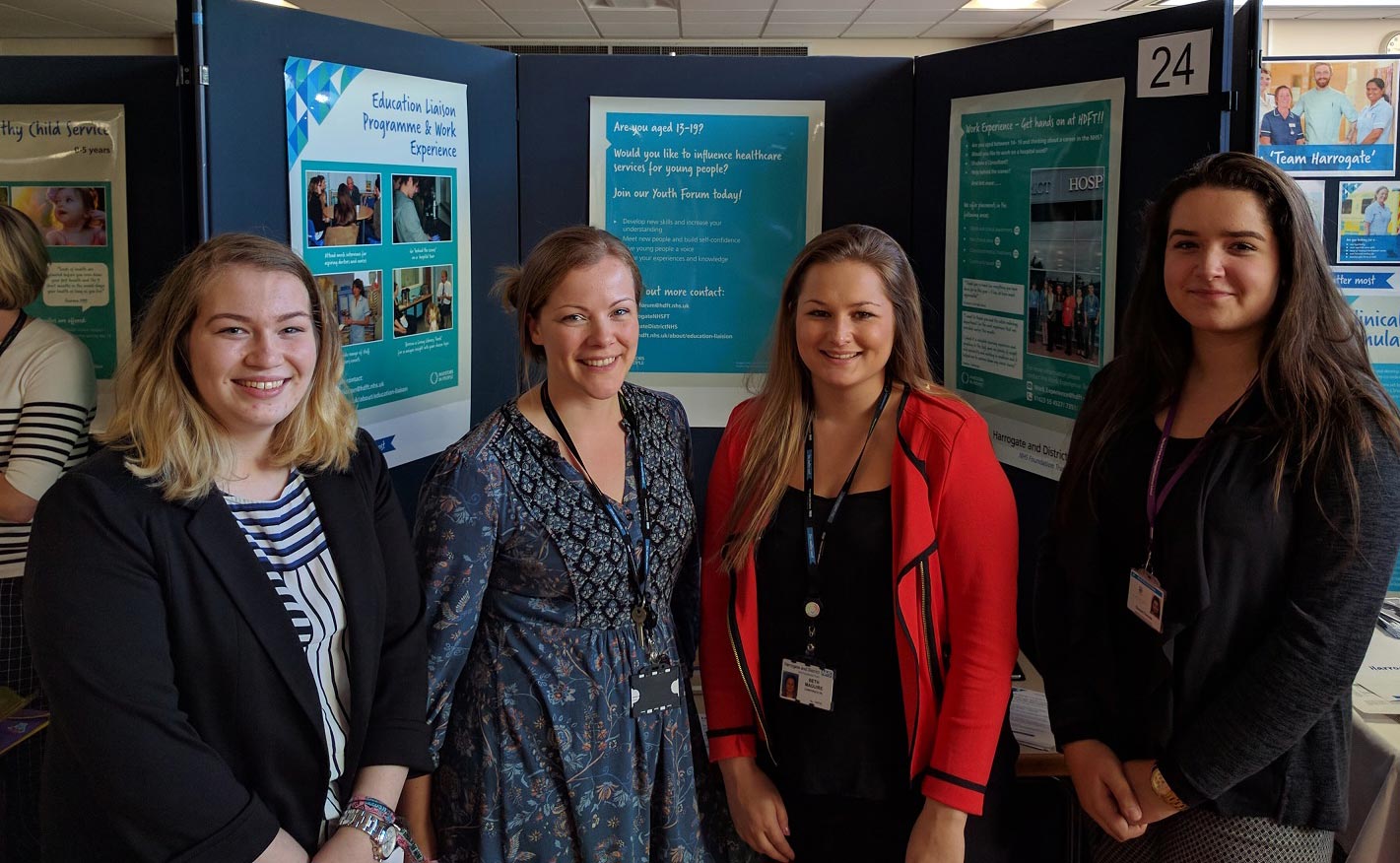 HDFT staff colleagues Emily Reid and Bethany Maguire (centre) with students Amy Wotherspoon and Hannah Zammitt) finding out more about the Youth Forum at the Trust’s Annual Open Event