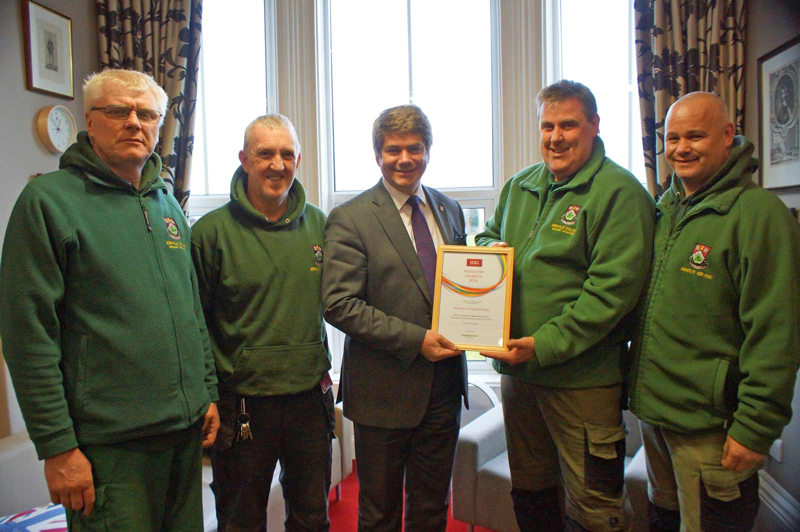 Growing Strong! Ashville College Headmaster Mark Lauder (centre) with groundskeepers (from left) John Pullan, Graham Oxley, Kevin Whorley and Karl Spink with the IOG certificate of commendation