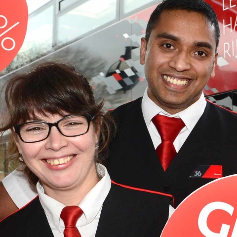 36 drivers, Sandra Fernandes and Bijumon George and a 36 bus at Harrogate Bus Station