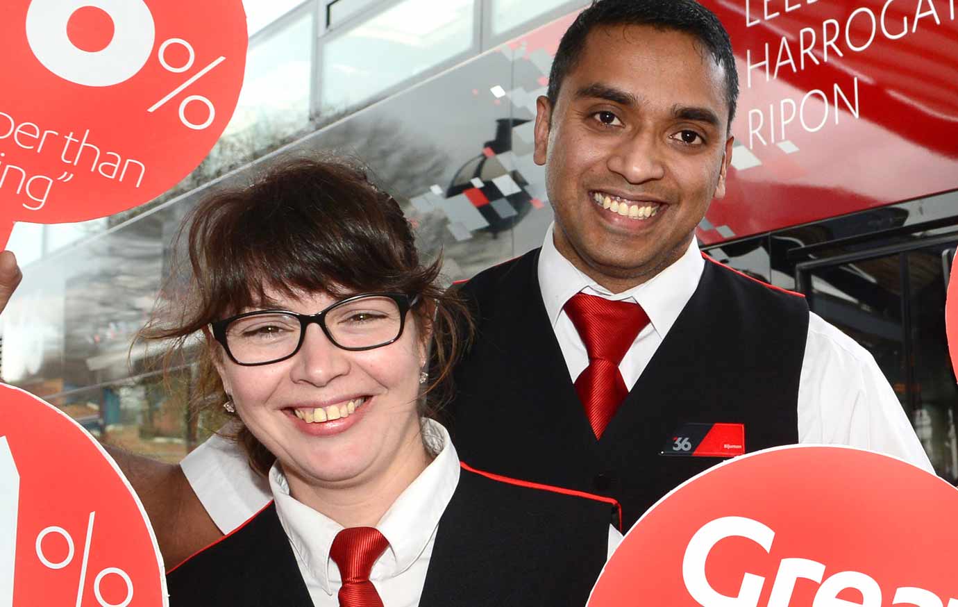 36 drivers, Sandra Fernandes and Bijumon George and a 36 bus at Harrogate Bus Station