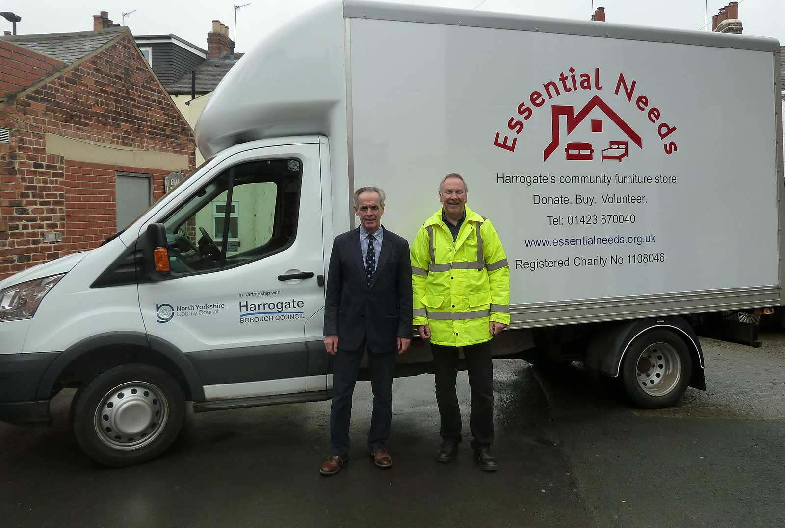 Essential Needs new van signage with Trustee, Cllr Don Mackenzie (left) and Essential Needs Driver, Phill Brownley