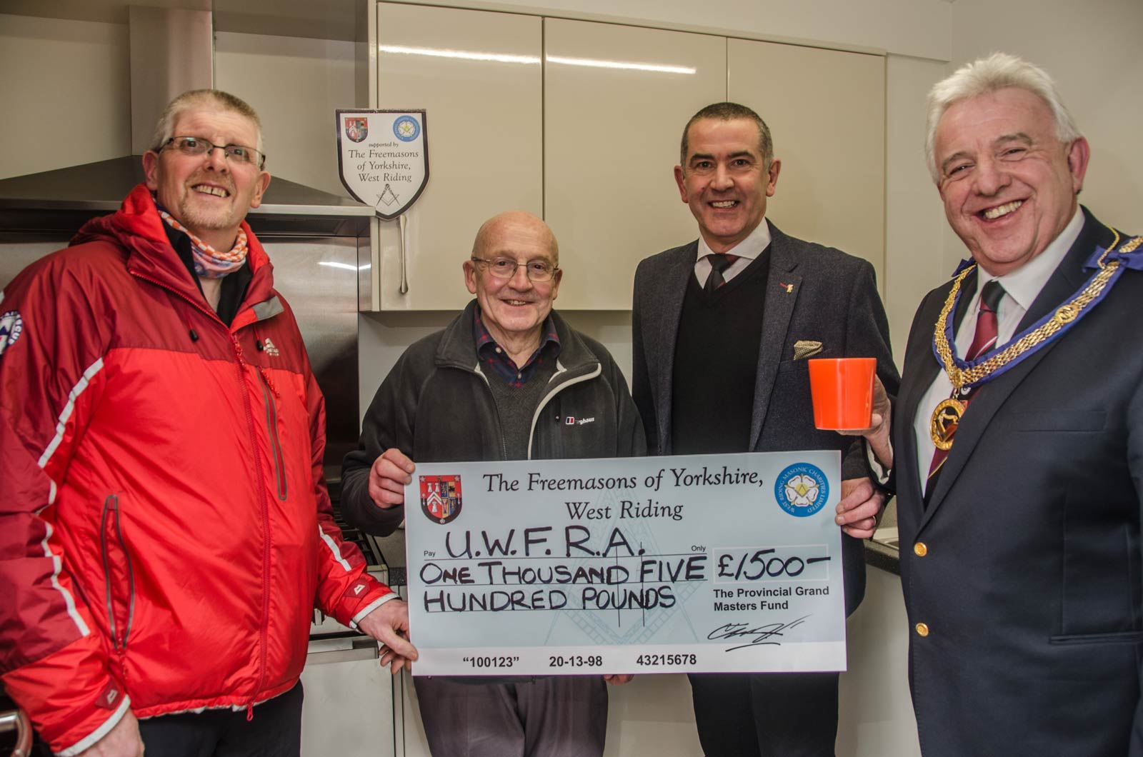 Freemasons To The Rescue! Pictured from left to right are Stuart Benson, Paul Collinge and Phil Atkinson from Olicana Lodge, and Roger Newhouse, the Assistant Provincial Grand Master of the Province of Yorkshire West Riding (picture by Sara Spillett)