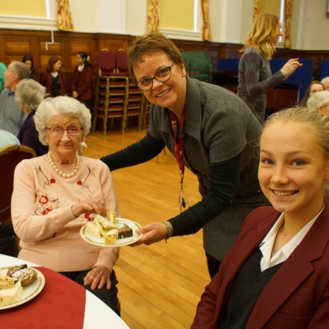 Tea for 32! Berwick Lodge Care Home resident Margaret Noble with Year 11 pupil Sophie Rastrick and Catherine Frieze, Ashville College’s volunteer co-ordinator