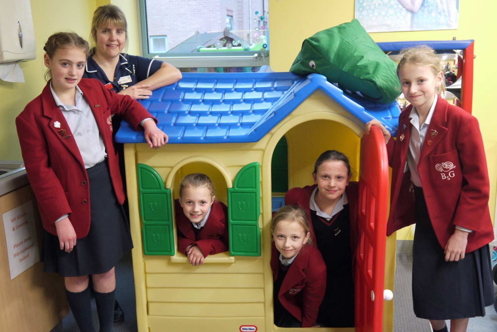 Sister Helen Matusewich, of Harrogate District Hospital’s Woodlands Ward with, from left to right, Isabelle Jones, Darcey Garforth-Nelson (window), Tilly Thompson, Zahra Watson (Door) and Sarah Callander