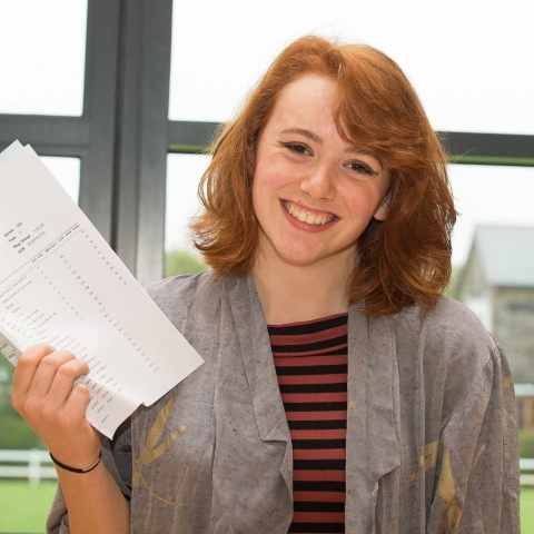 Year 11 student, Ellen Young receiving her GCSE results in 2016