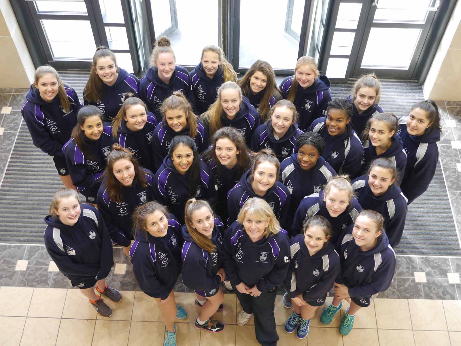 GSAL U14, U16 and U19 netball teams with head of netball Cath Johnson Back L-R: Elise Waldron-Hoines (Bramhope), Abby Hudson (Scarcroft), Claudia Stead (Kirkby Overblow), Molly Harris (Roundhay), Imogen Abrahams (Alwoodley), Lindsey Fowler (East Keswick), Isabelle Howse (Boston Spa), Third row L-R: Nicole Dilasser (Harrogate), Ailsa Gorman (Bramhope), Gabby Aston (Alwoodley), Jessie Ducker (West Park), Georgia Pexton (Alwoodley), Savannah Dada-Mascoll (Moortown), Izzi Adamson (Sicklinghall), Aisha Nazir (Roundhay), Second row L-R: Louise Marsden (Alwoodley), Duresha de Zoysa (Alwoodley), Imogen Bates (Farnley, Otley), Ellie Sowerby (Harrogate), Queeny Njoyo  (Gipton), Evie Ramsbottom (Menston), Molly Gray (Alwoodley), Front (L-R): Eloise Weaver (Bardsey), Sasha Bletcher (Harrogate), Katy Gannon (Alwoodley), Mrs Cath Johnson (GSAL head of netball), Georgina Pettit (Linton), Molly Dexter (Alwoodley)