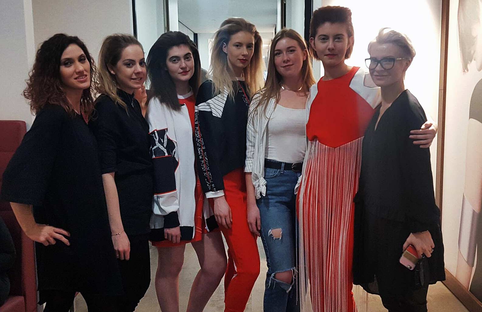Jospeh Ferraro Team, Harrogate, from left to right Rita Tuska, Elaine Sneddon and Marzena Serafin (dressed in all black) with models and the designer at London Fashion Week
