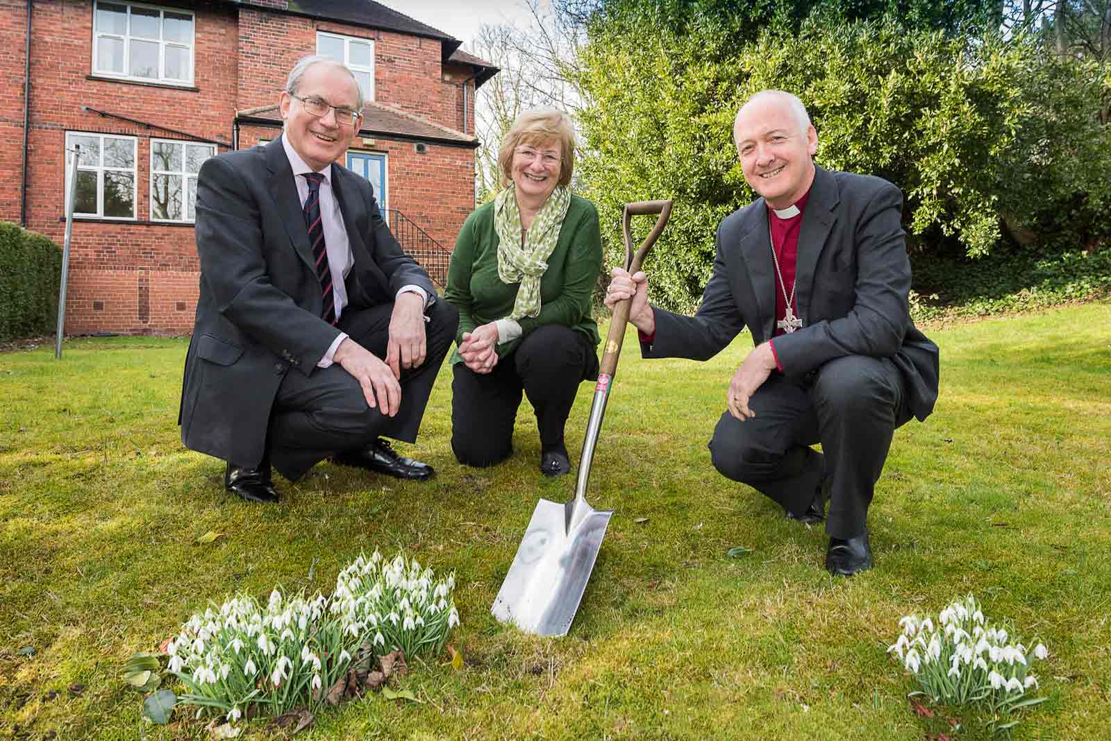 Nigel McClea and Moira Start of Wellspring and the Rt Rev Nick Baines, the Bishop of Leeds, outside Wellspring’s new premises and in the garden