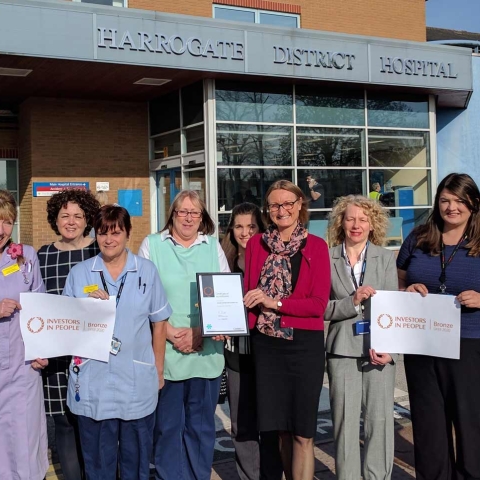Harrogate and District NHS Foundation Trust staff celebrate the Investors in People Bronze Accreditation