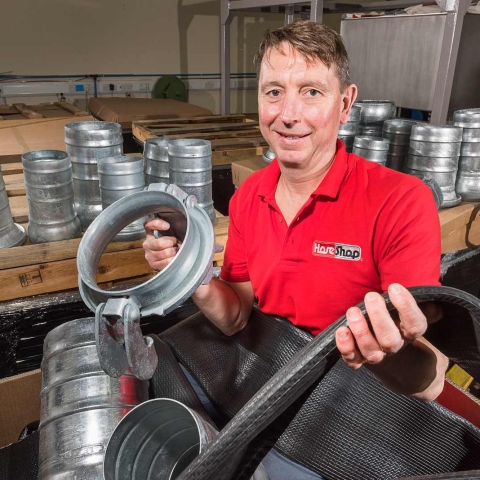 Hoseshop’s Mick Shakespeare in his Harrogate premises with some of the hoses and couplings supplied to a diamond mine in Angola