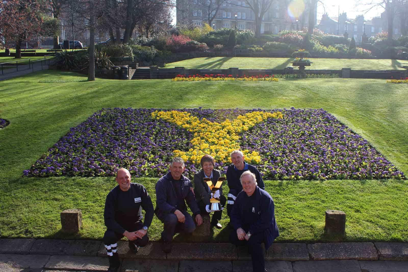 Tour de Yorkshire trophy flower bed: Gary Tulip (Gardener), Steve Metcalfe (Gardener), Sue Wood (HBC Horticultural Officer), Glenn Brookes (Gardener) and Barrie Stringer, (Harlow Hill Nursery Operations Manager)