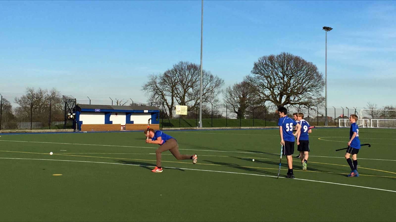 Jonny Bairstow showing his hockey skills to some of the junior members