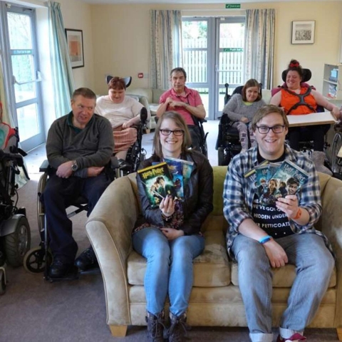 Kirsty Dodge and Tim Henton (front seated) with some of the residents living at Disability Action Yorkshire’s Claro Road care home