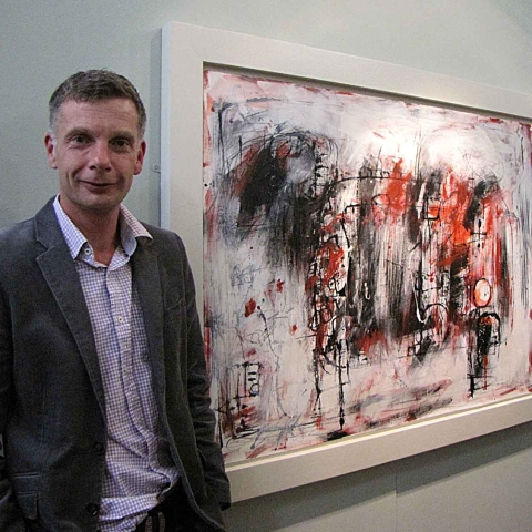Adam King, first prize winner at the Harrogate Open in 2010, with his painting ‘The Scapegoat’ which is now in the Mercer collection