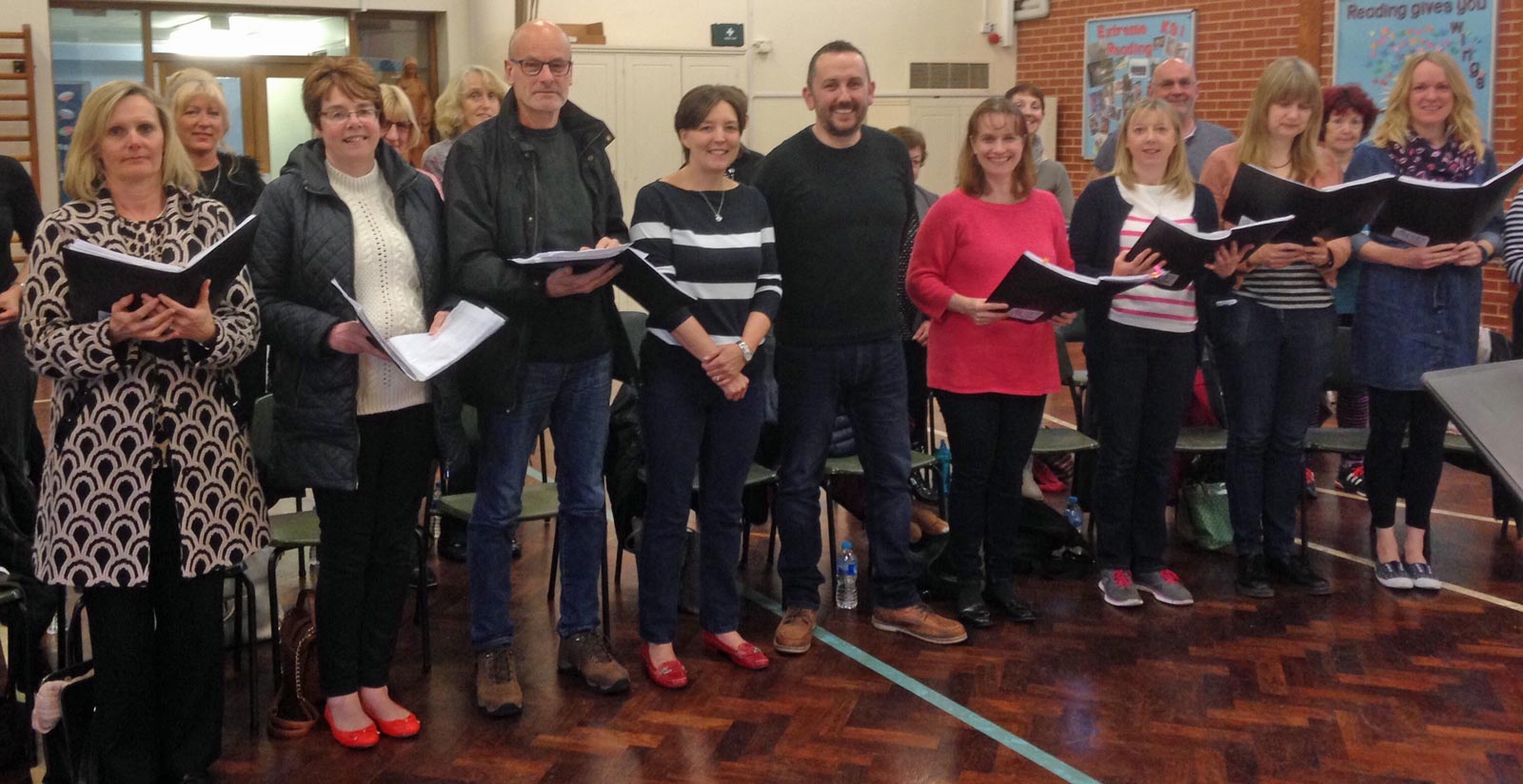 All Together Now Community Choir rehearsing ‘One Day Like This’ by Elbow with Kathryn Scott (Blue &white jumper) from the Almsford Community Fun Day team