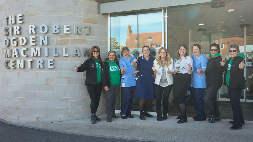 Thumbs up for a successful challenge…(L-R): Helen Stobart; Edwina Sorkin; Heather Priestley, chemotherapy nurse; Brenda McKenzie, unit manager; actress Emma Atkins; Sarah Grant, information and health and wellbeing manager; Rachel Sanderson, chemotherapy nurse; Liz Tinkler and Kate Sleath