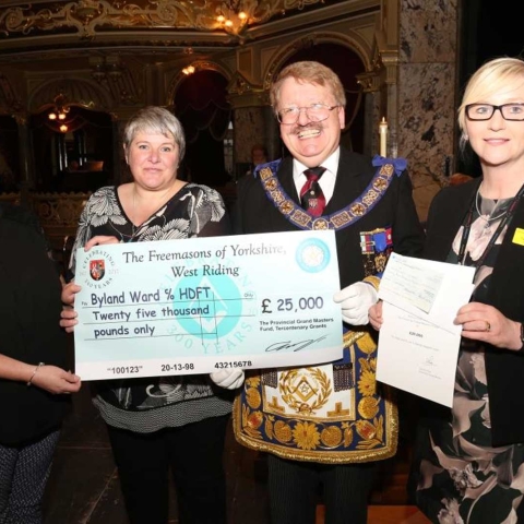 Major Contribution! The Provincial Grandmaster for the Province of Yorkshire West Riding, David S Pratt, with Byland Ward representatives Tammy Gotts, Adele Dungey and Tracy Campbell