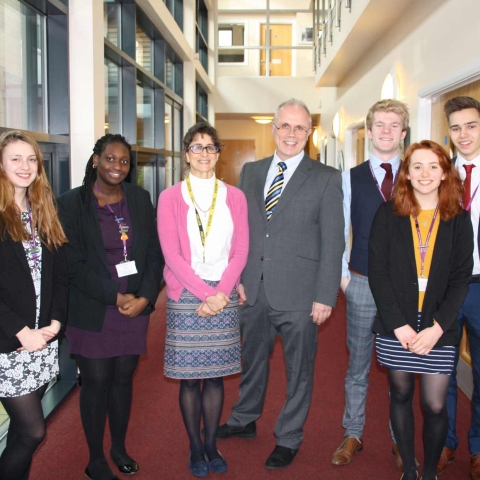 Year 12 students - Kate Watson and Mam Jallow, Former Head Girl - Michelle Mohajer, Former Head Boy – Alistair Gibb, students – George Kendall, Ellen Young and Owen Jones